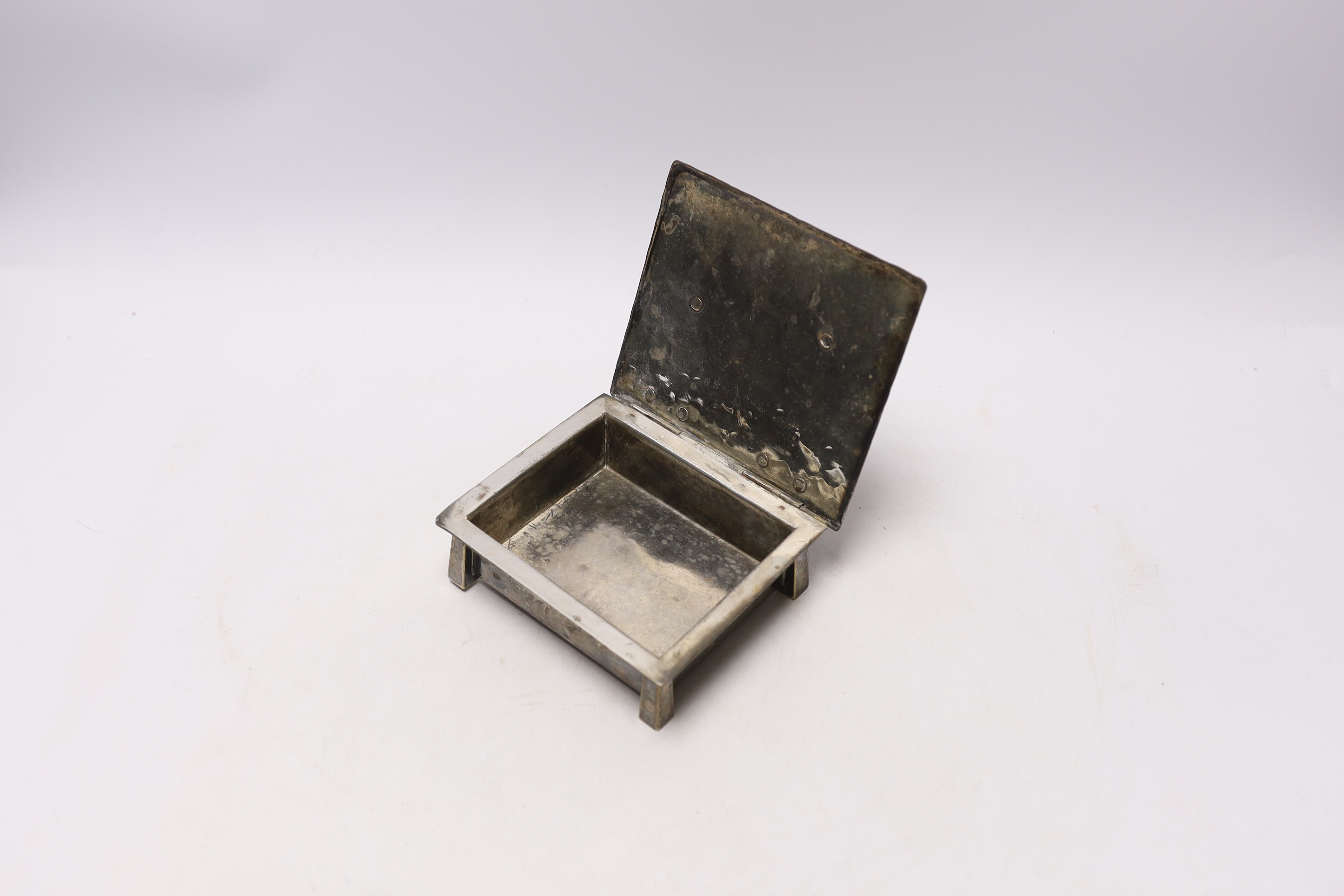 An Arts & Crafts silver plated box, with strap hinges and hammered finish, 13 x 11.5 x 4cm